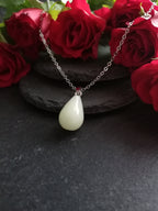Chaîne lumineuse phosphorescente • Collier en argent avec pendentif lumineux • JoJos Presents