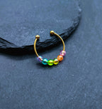 Bague anti-stress colorée avec perles arc-en-ciel – bague ludique et divertissante réglable pour la vie quotidienne ou l'école | Kalea