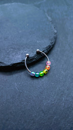 Bague anti-stress colorée avec perles arc-en-ciel – bague ludique et divertissante réglable pour la vie quotidienne ou l'école | Kalea
